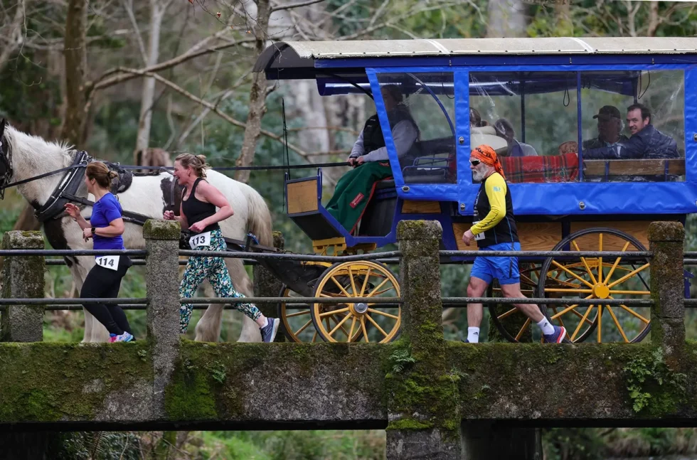 Wander Wild Festival Hardman Run people running over brige with jaunting car in the backound