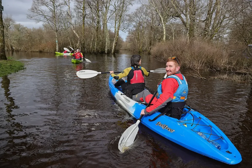 Wander Wild Festival couples kayaking on Killarney lakes