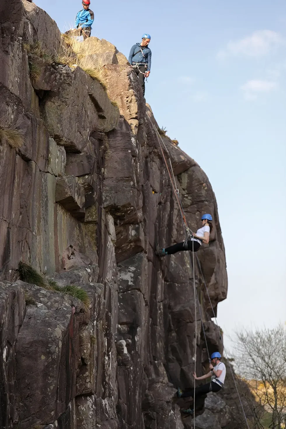 Wander Wild Festival people abseiling down rocks