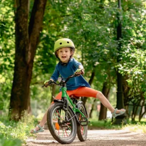 Kid learning how to ride a bike