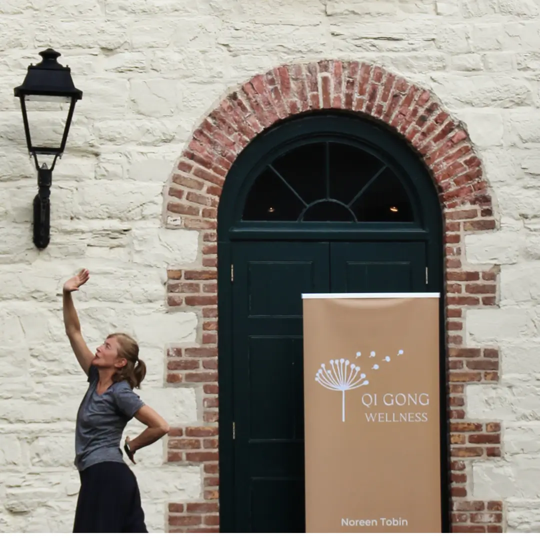 woman in killarney house doing qi gong