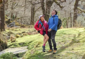 Wander Wild Roz Purcell laughing in man arms