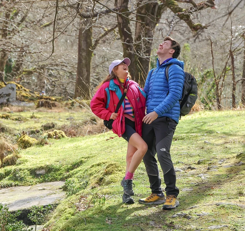 Wander Wild Roz Purcell laughing in man arms