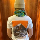 Back view of a lady wearing a wander wild white tshirt