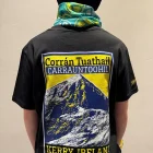 Back view of someone wearing a black wander wild tshirt