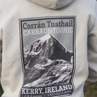 Someone wearing a sand Wander WIld Hoodie