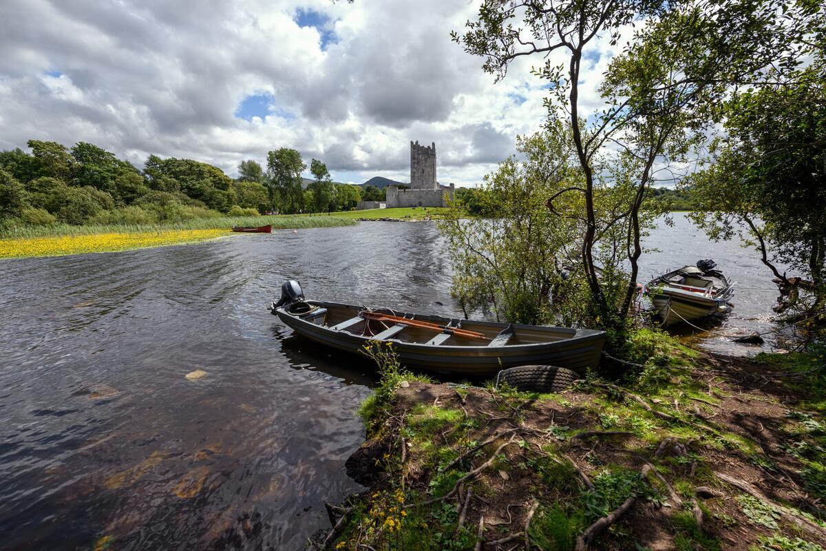 A boat docked near Ross Castle