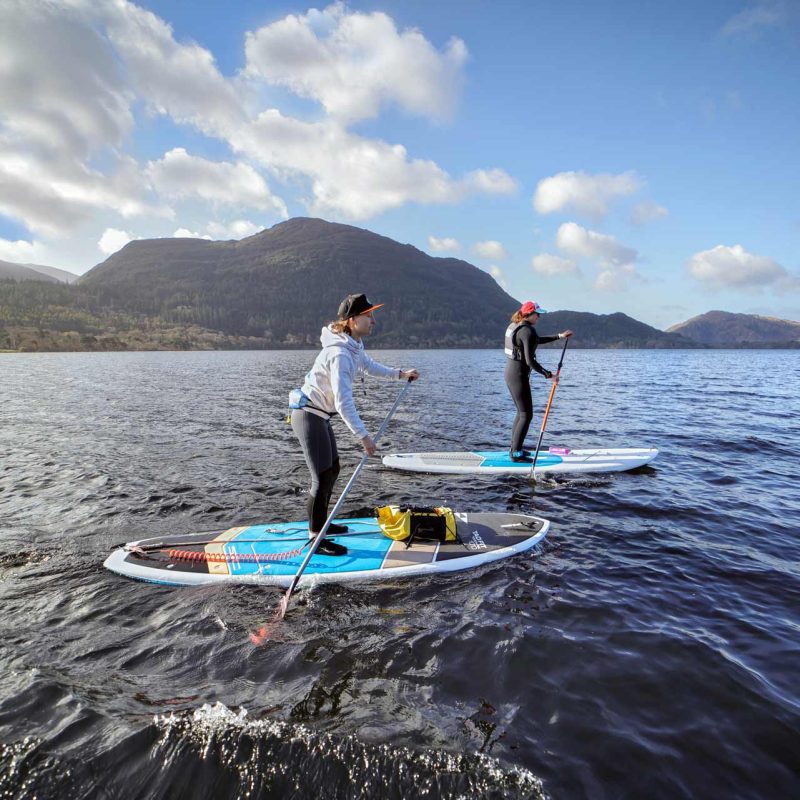 Two people kayaking on the lakes of Killarney