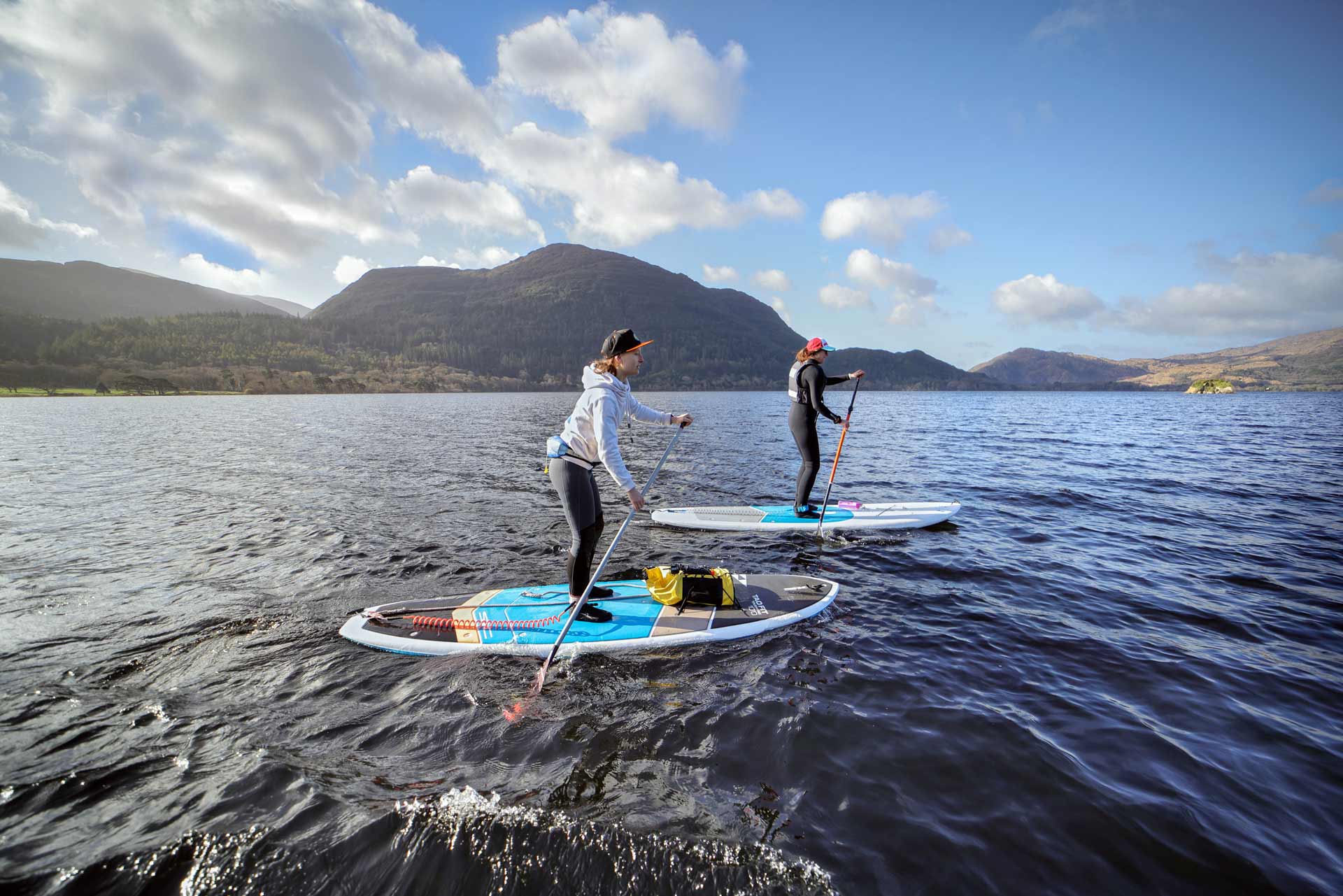 Two people kayaking on the lakes of Killarney
